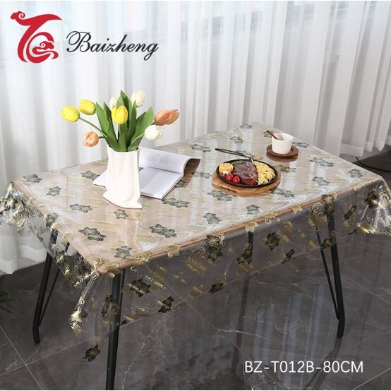 Клеенка силиконовая 0,8*20 м 0,7 мм черно-золотые цветы на прозрачном Baizheng (1/1)